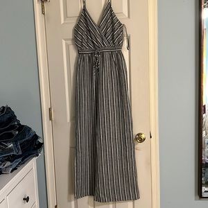 Love Culture Size Medium Pants Romper. NEW WITH TAGS.